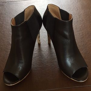 Coach bootie with snake skin heels